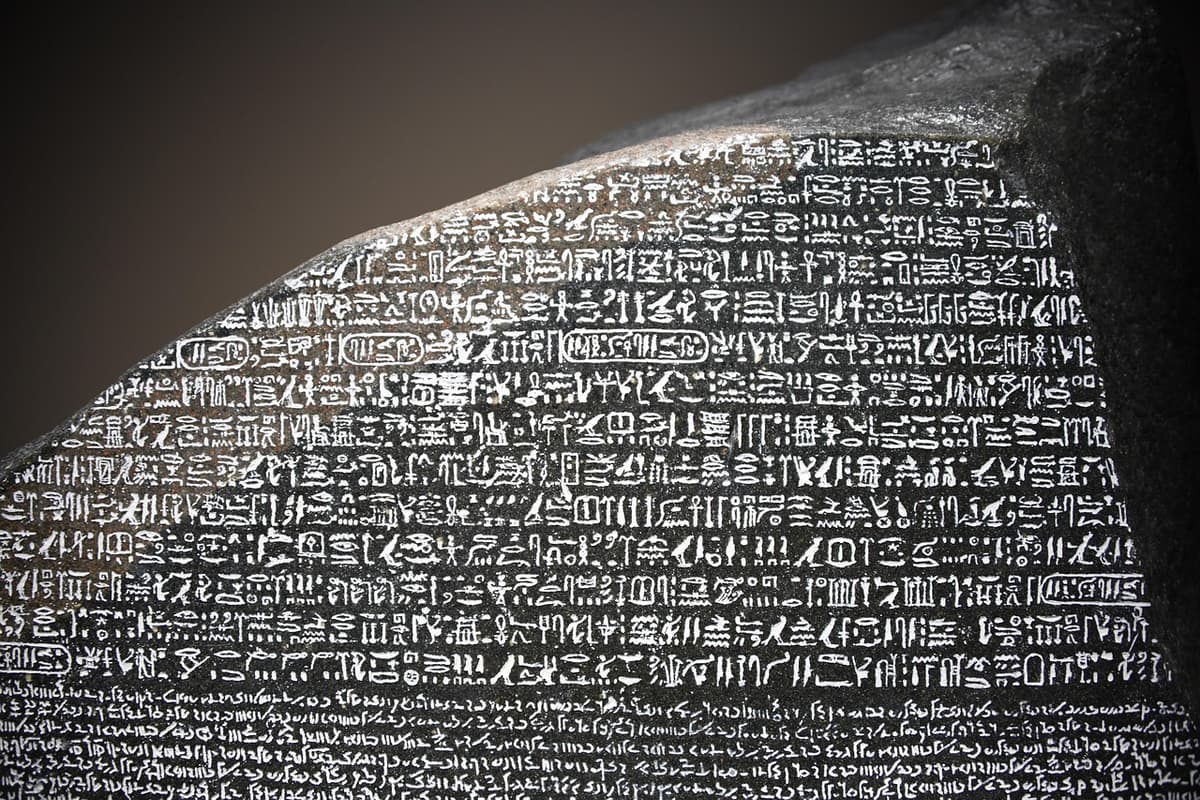 A carved stone surface symbolizing universal translation.